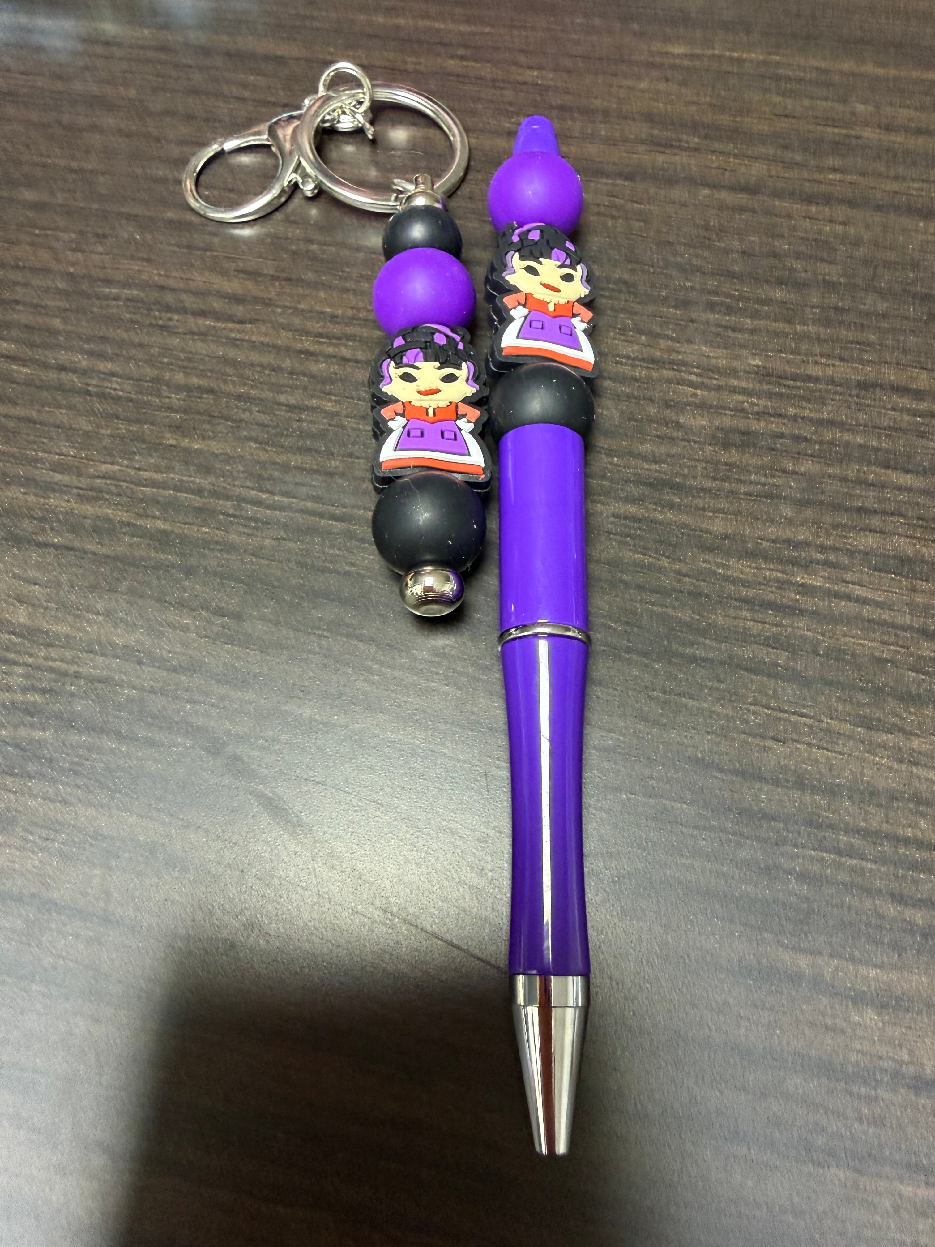 Halloween character, keychain, and pen sets.