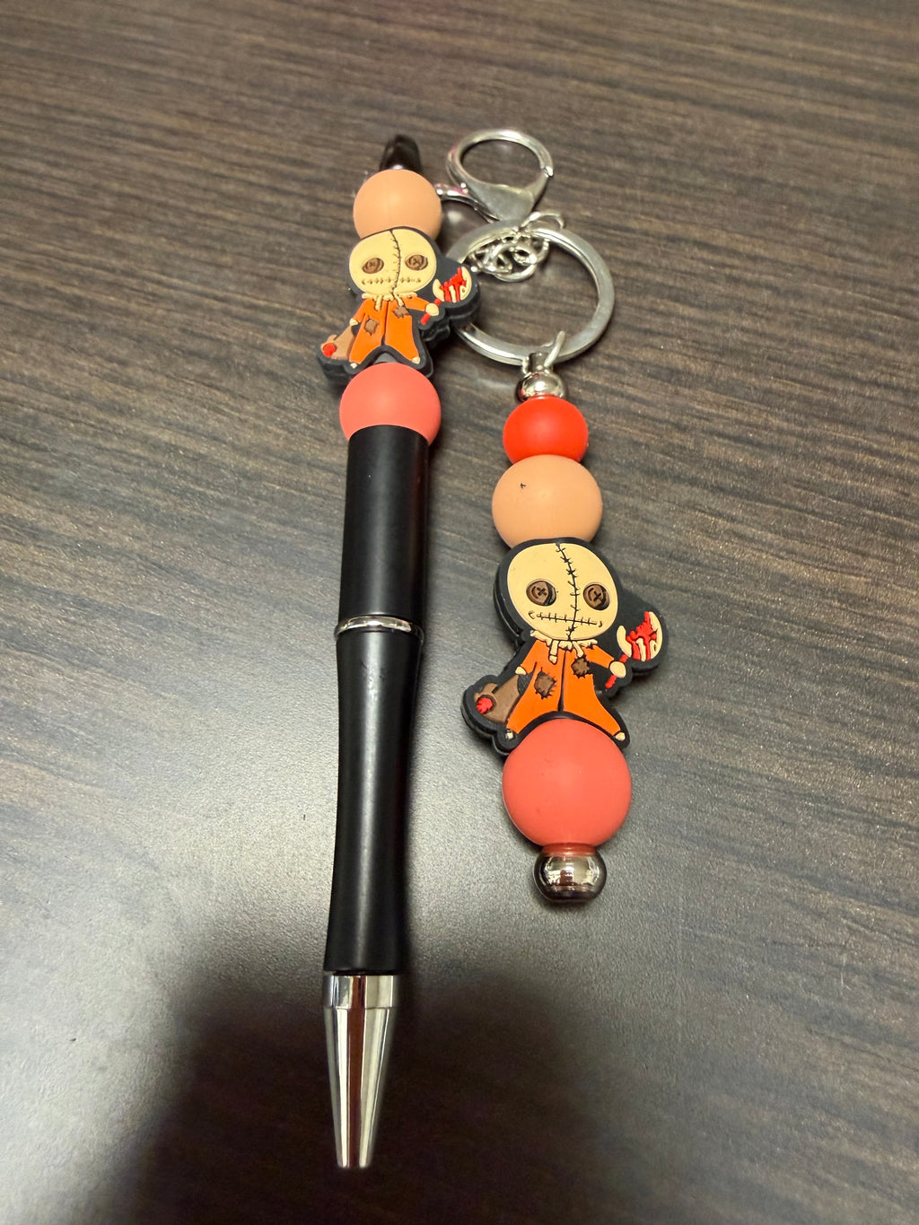 Halloween character, keychain, and pen sets.