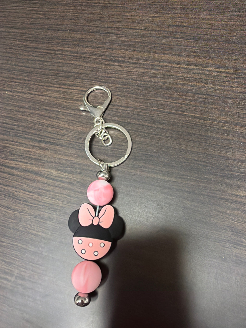 Silicone mouse head keychains.