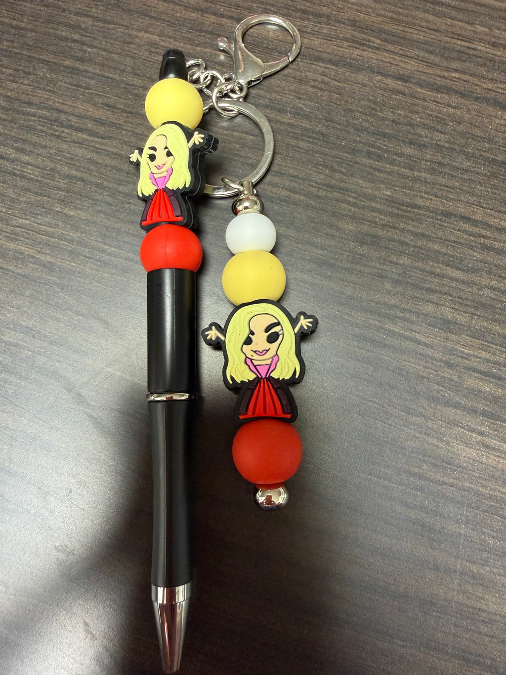Halloween character, keychain, and pen sets.