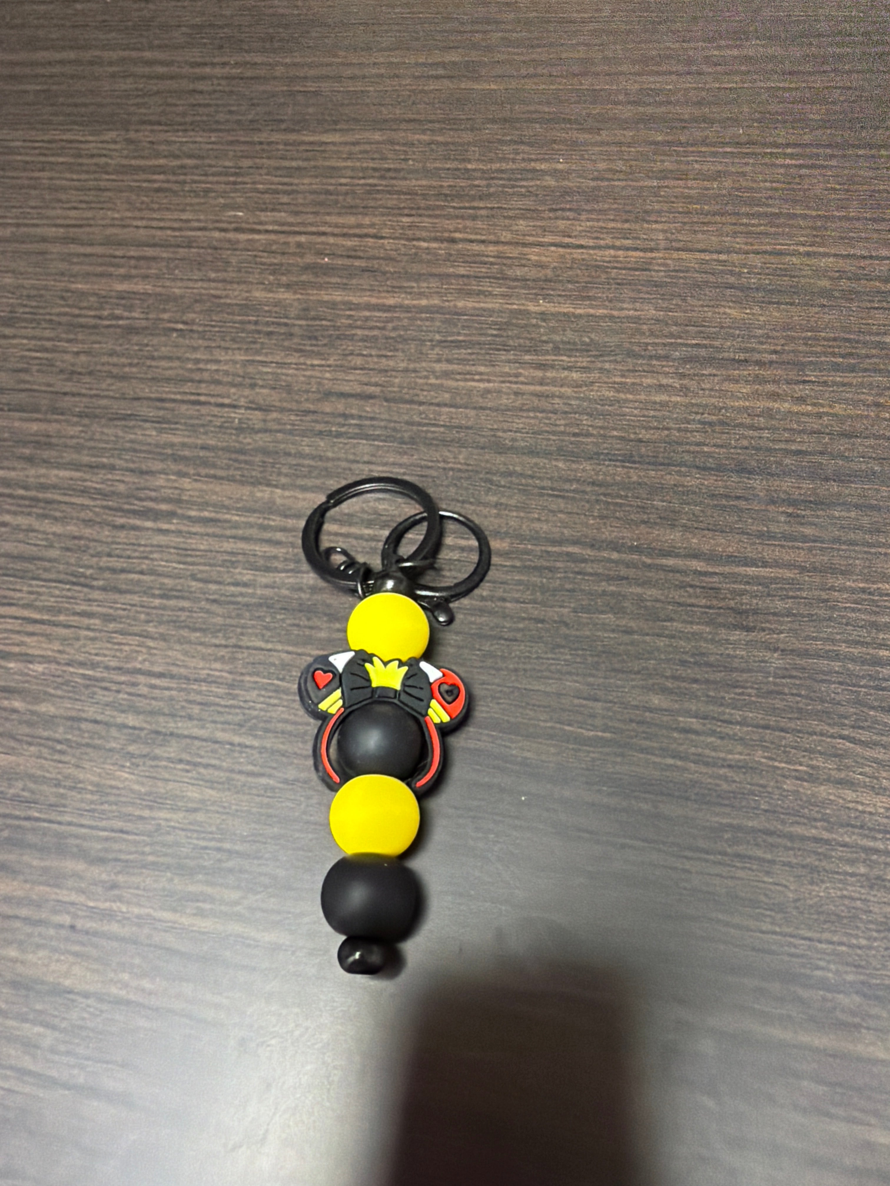 Silicone mouse head keychains.