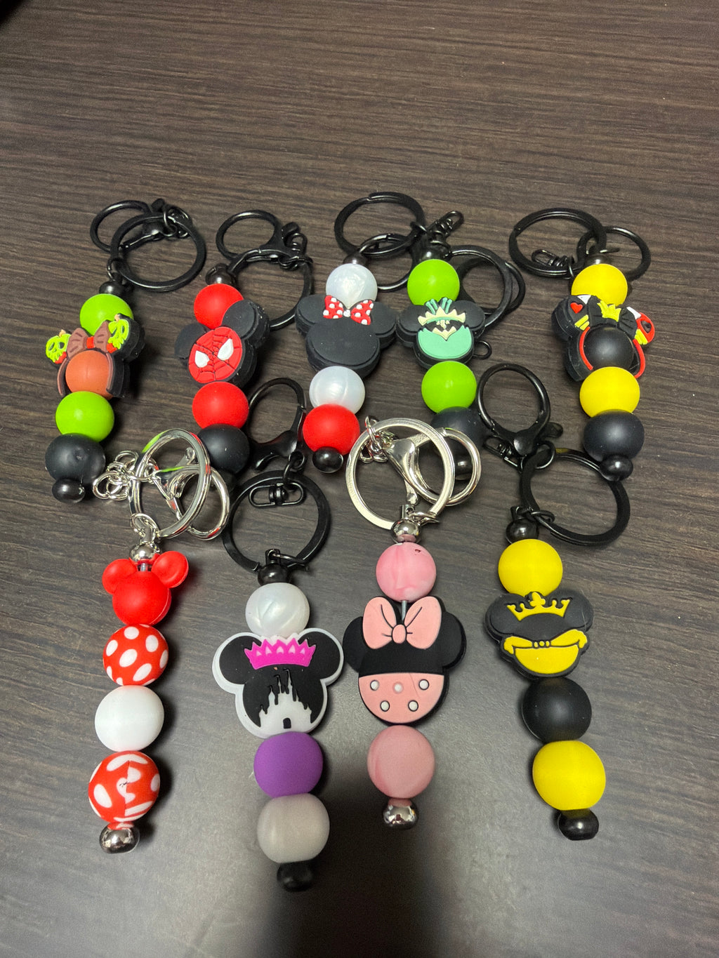 Silicone mouse head keychains.
