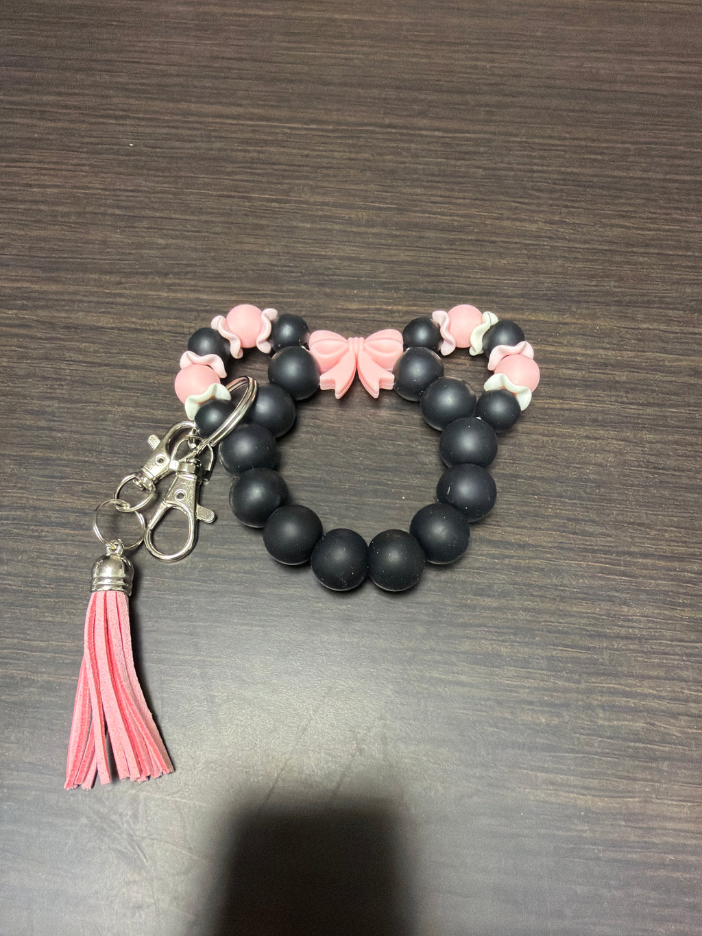 Mouse head silicone keychains.