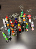 Assorted character silicone keychains.