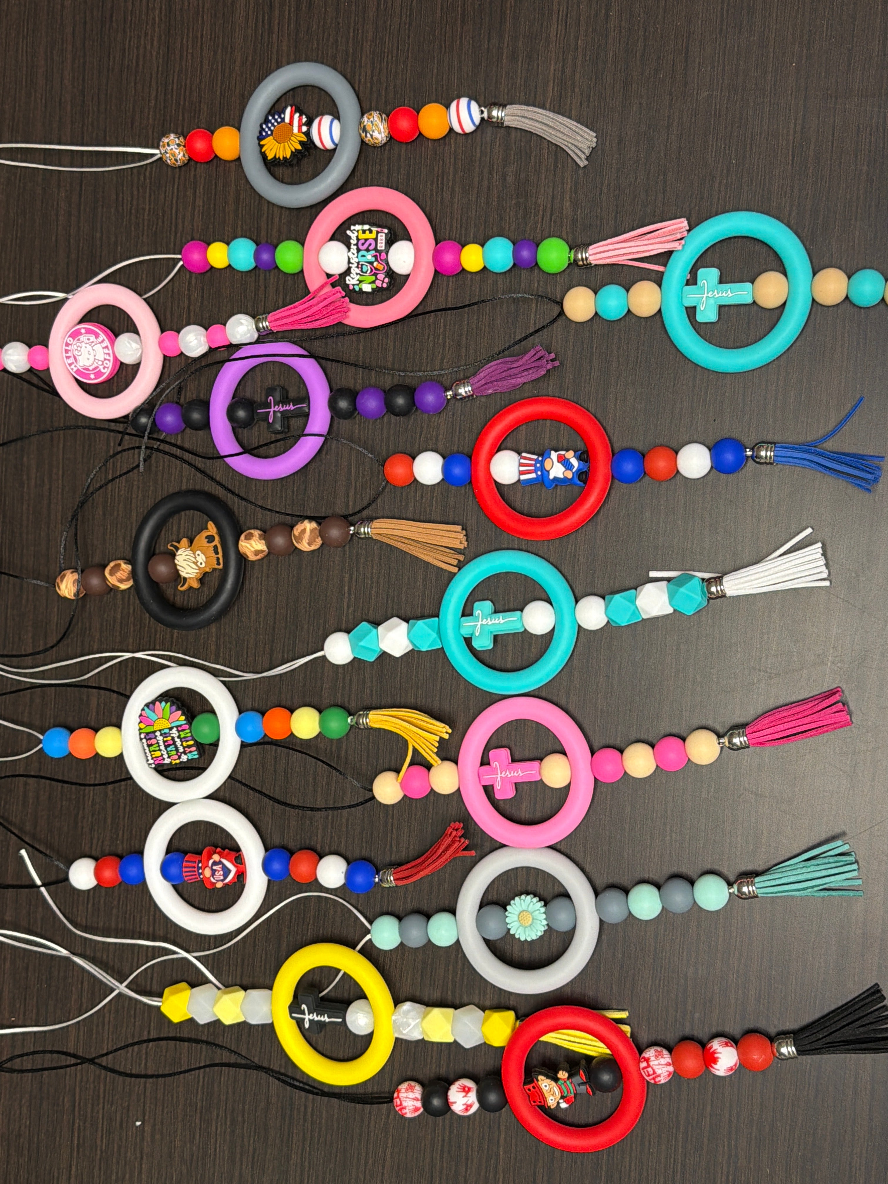 Assorted rearview mirror decorations.