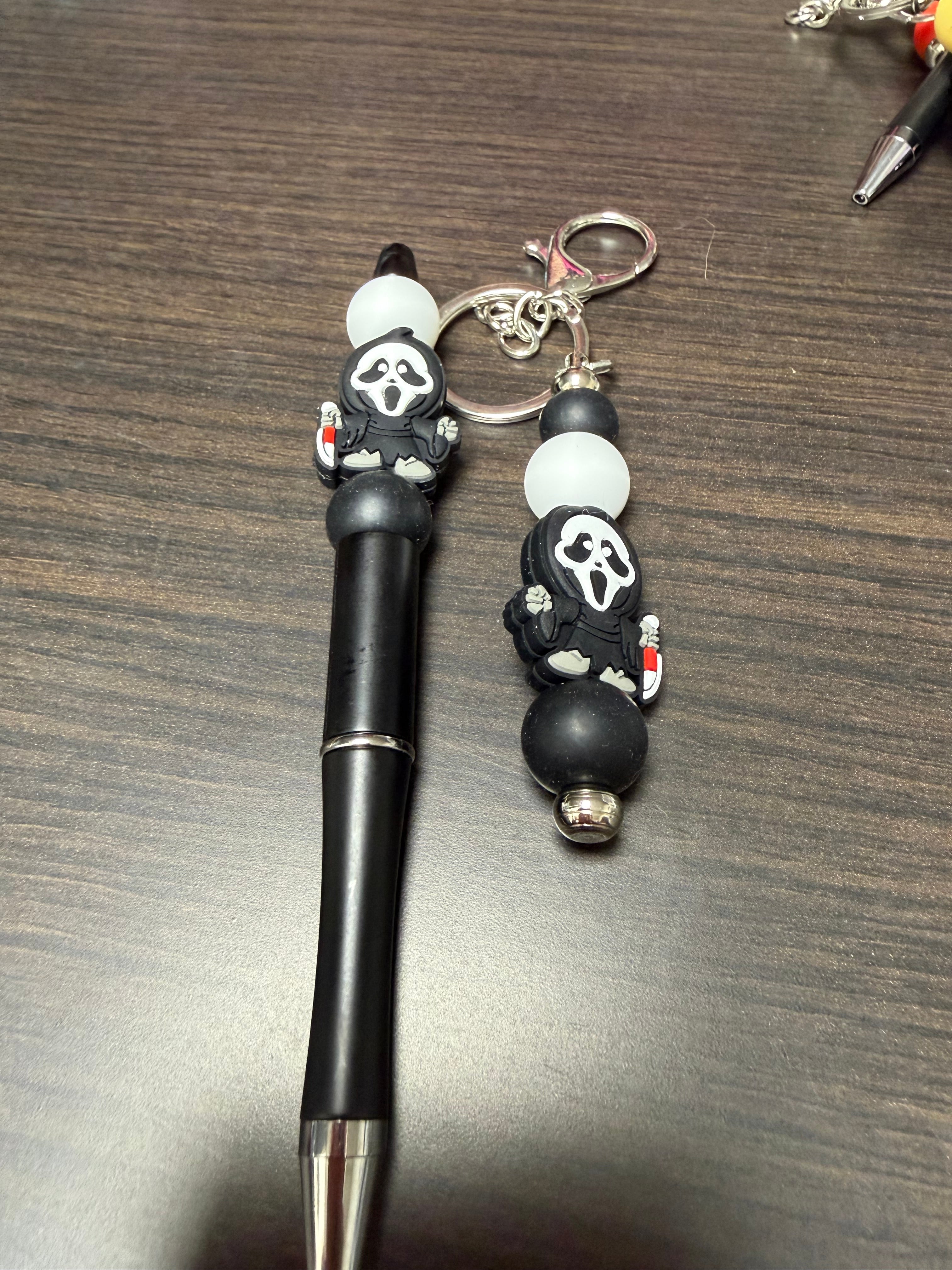 Halloween character, keychain, and pen sets.