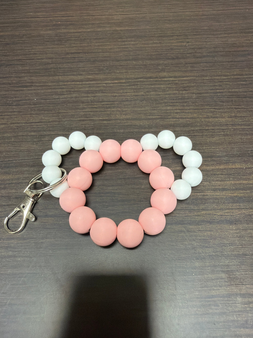 Mouse head silicone keychains.