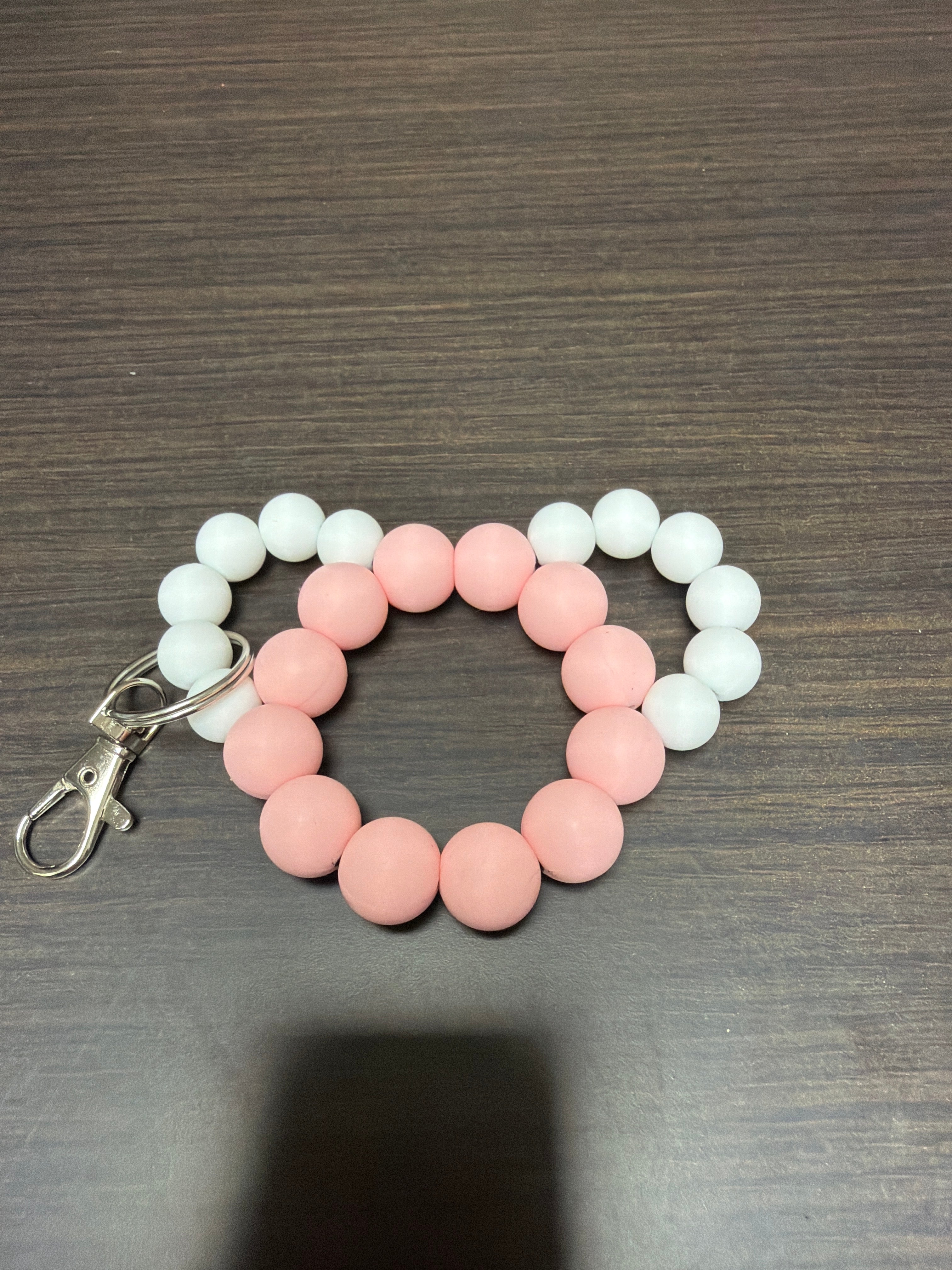 Mouse head silicone keychains.
