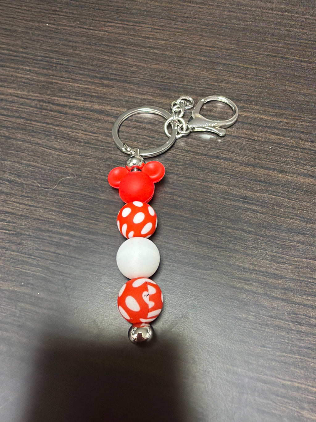Silicone mouse head keychains.