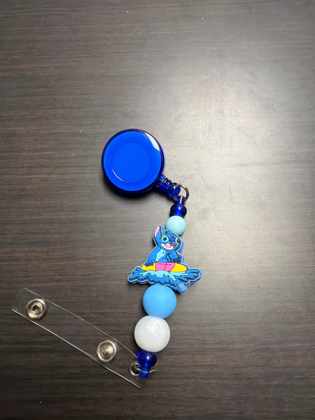 20 assorted character badge reels five dollars apiece.