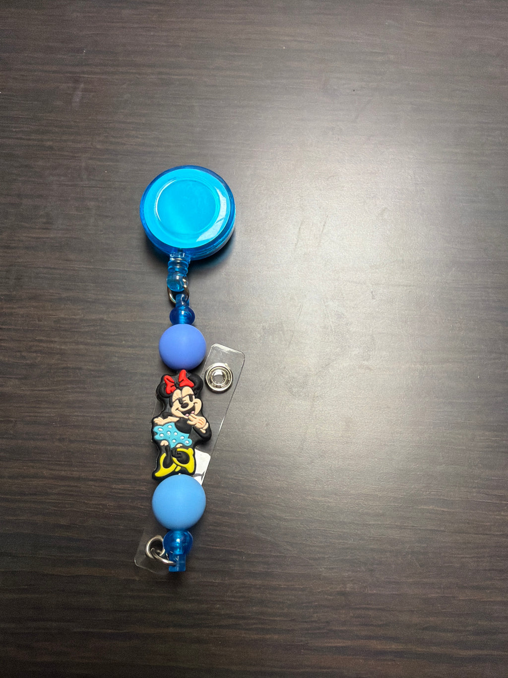 20 assorted character badge reels five dollars apiece.