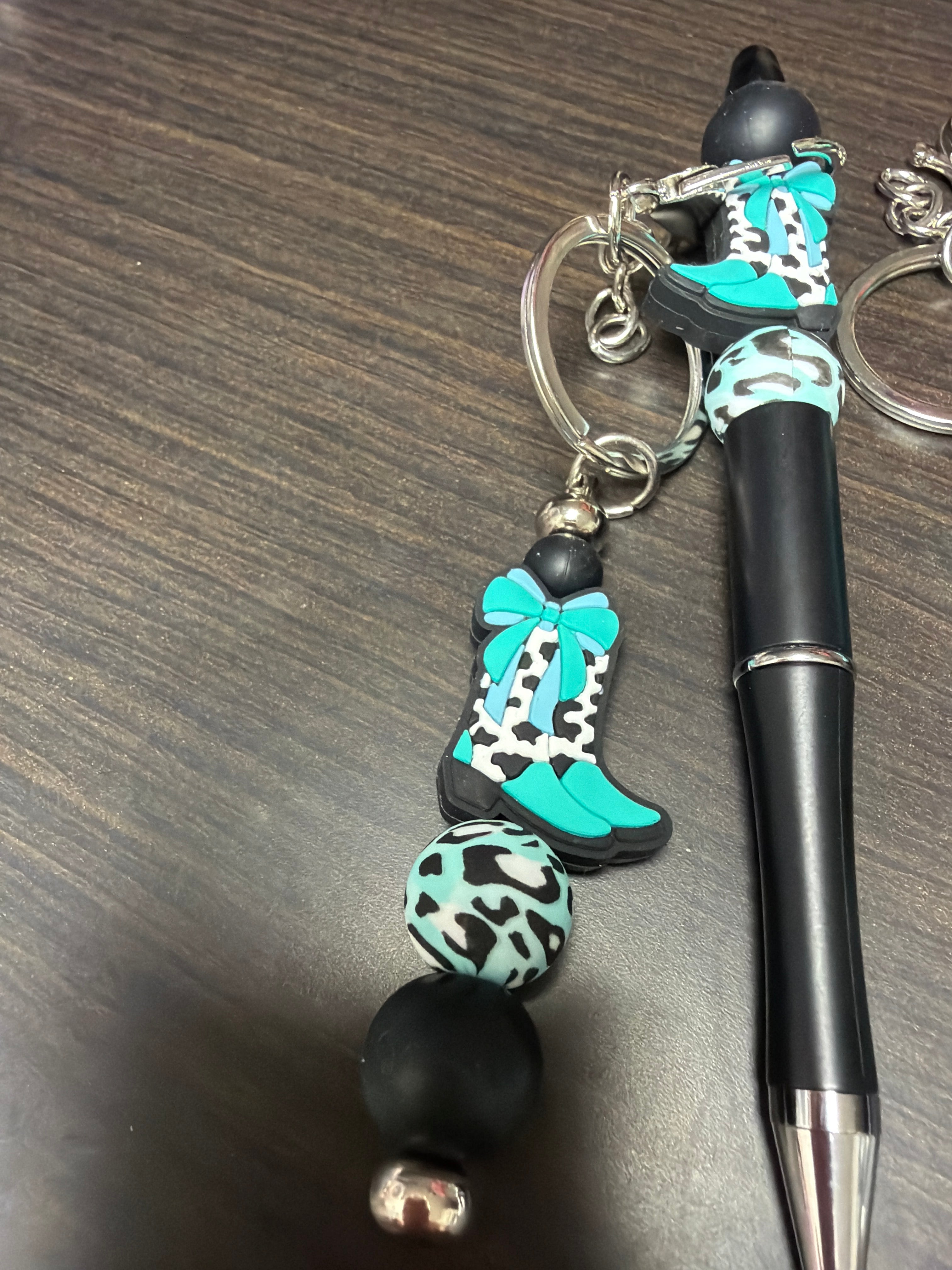 Keychain and pen combos eight dollars ￼