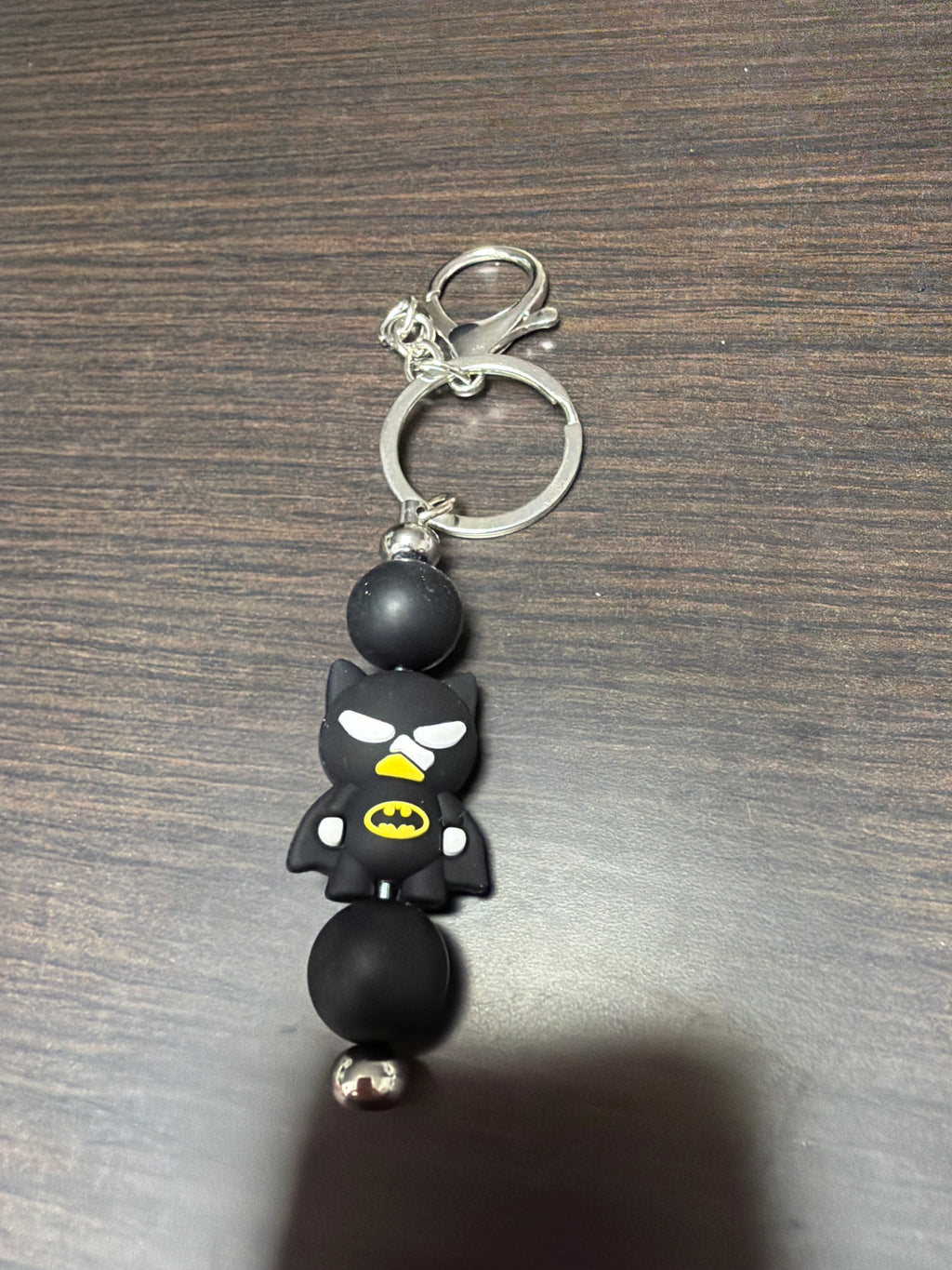 Assorted character silicone keychains.