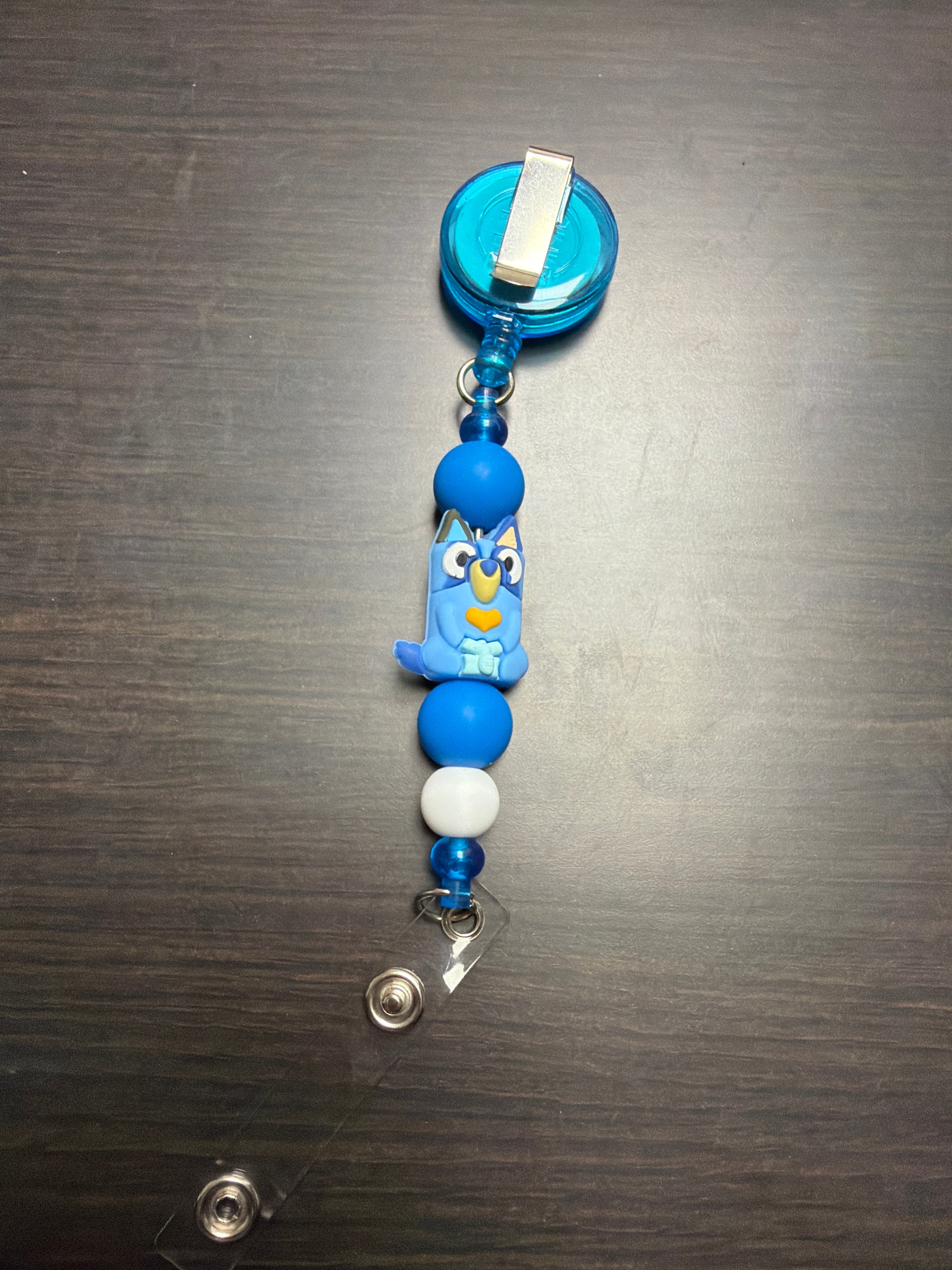 20 assorted character badge reels five dollars apiece.