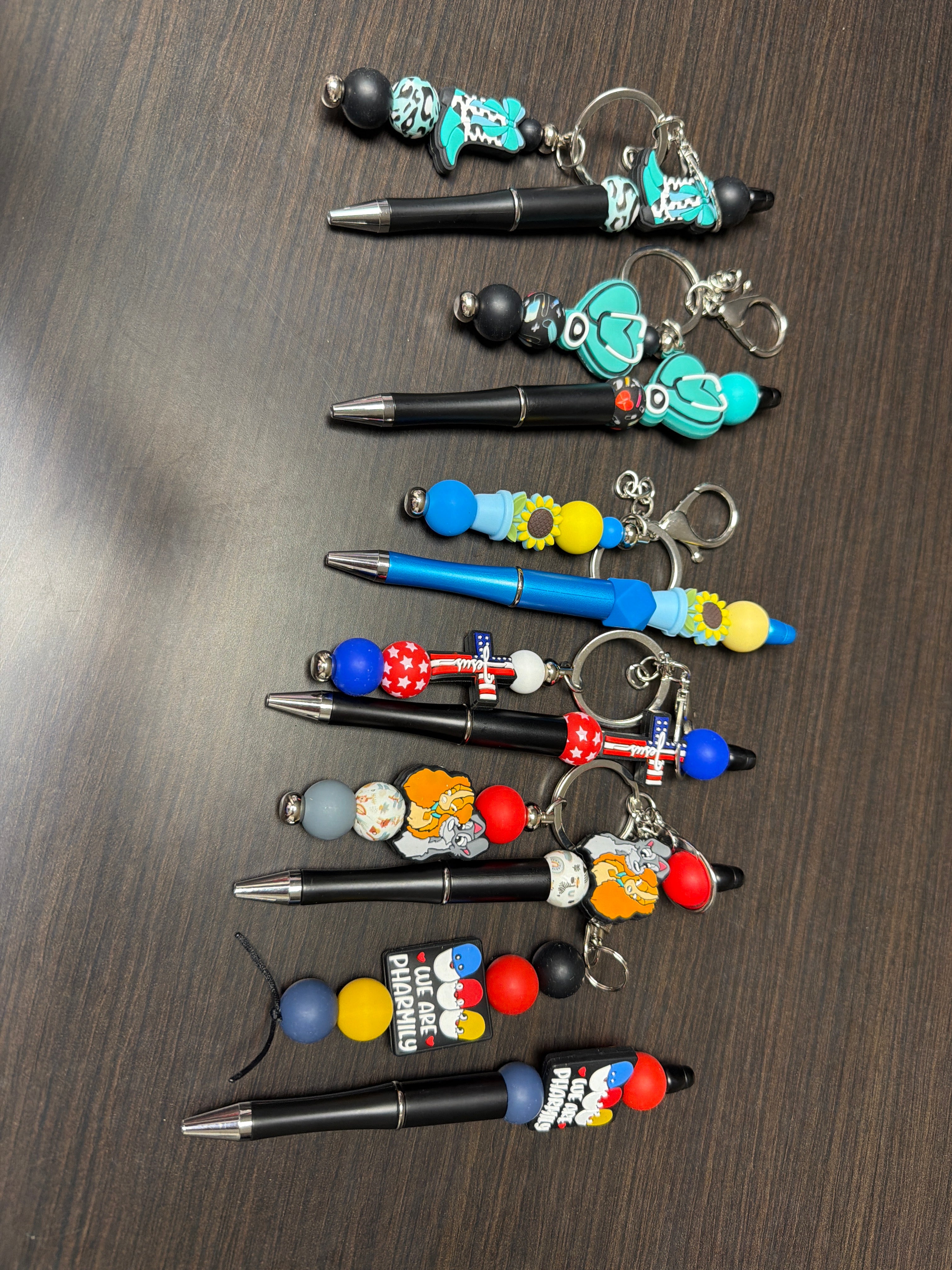 Keychain and pen combos eight dollars ￼