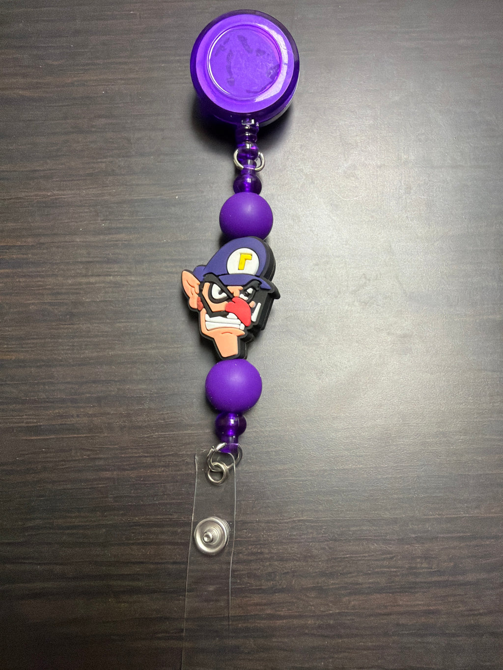 20 assorted character badge reels five dollars apiece.