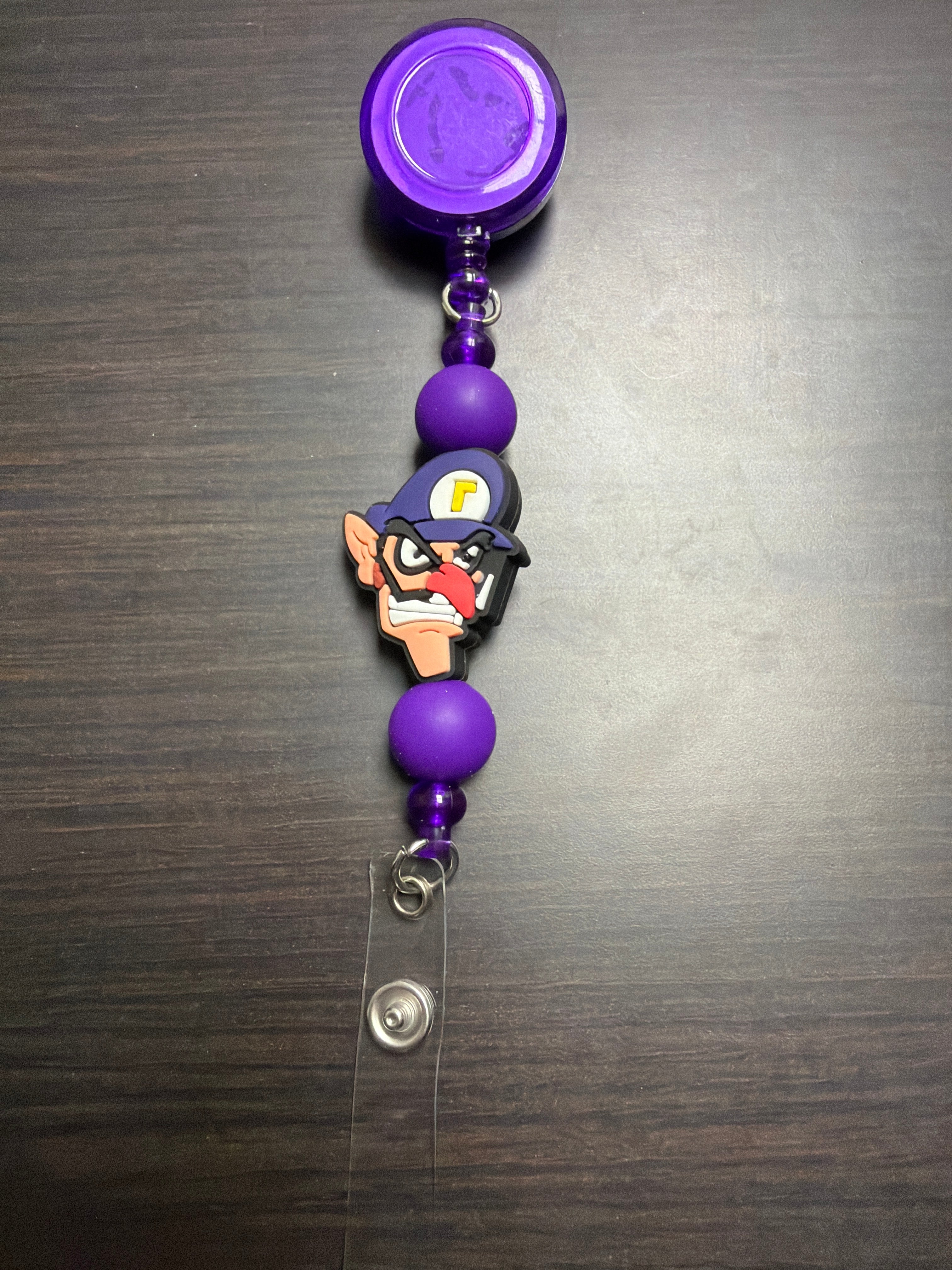 20 assorted character badge reels five dollars apiece.