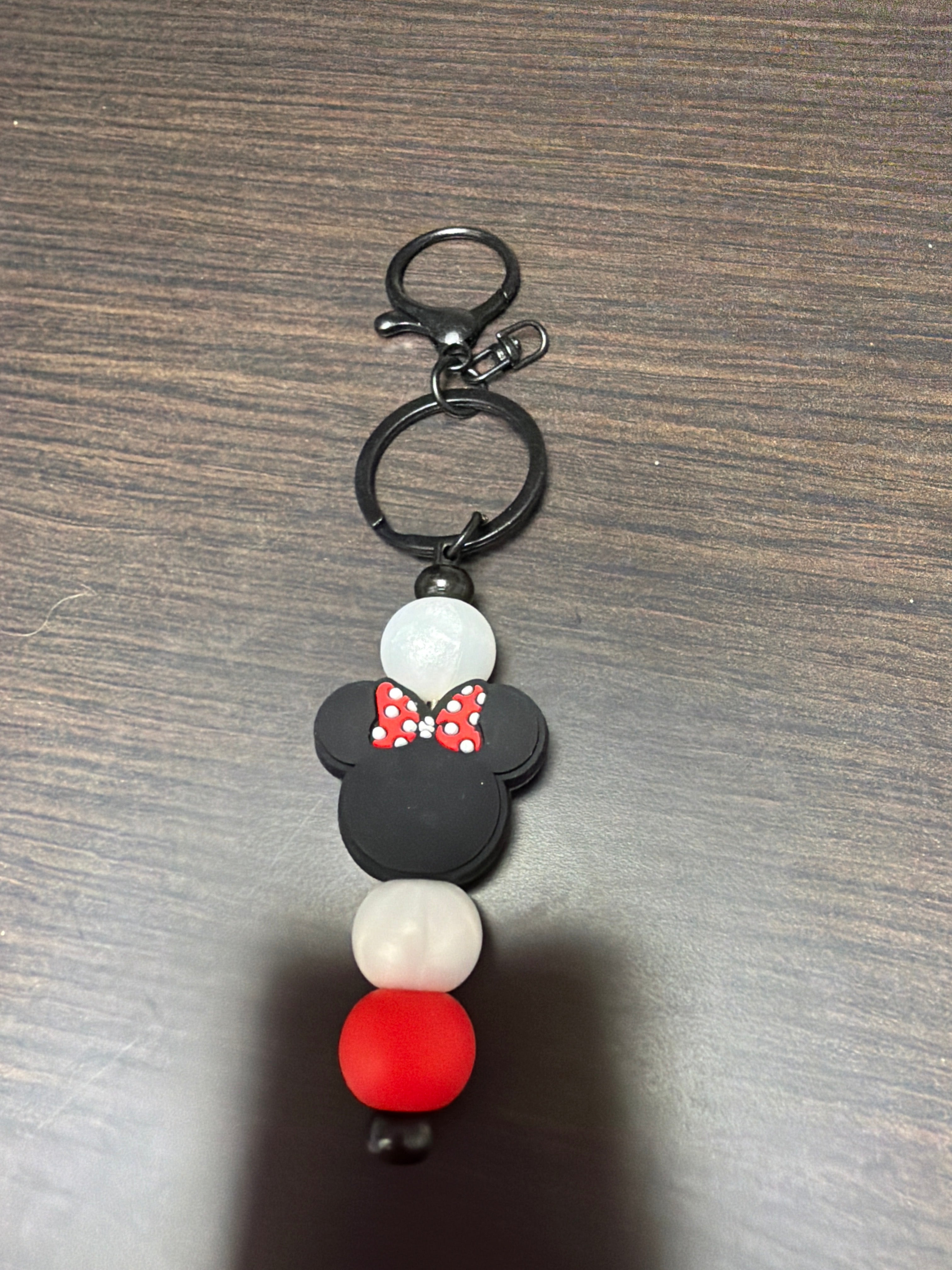 Silicone mouse head keychains.
