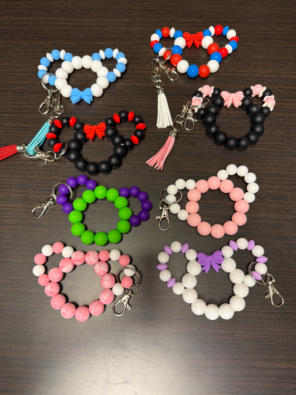 Mouse head silicone keychains.