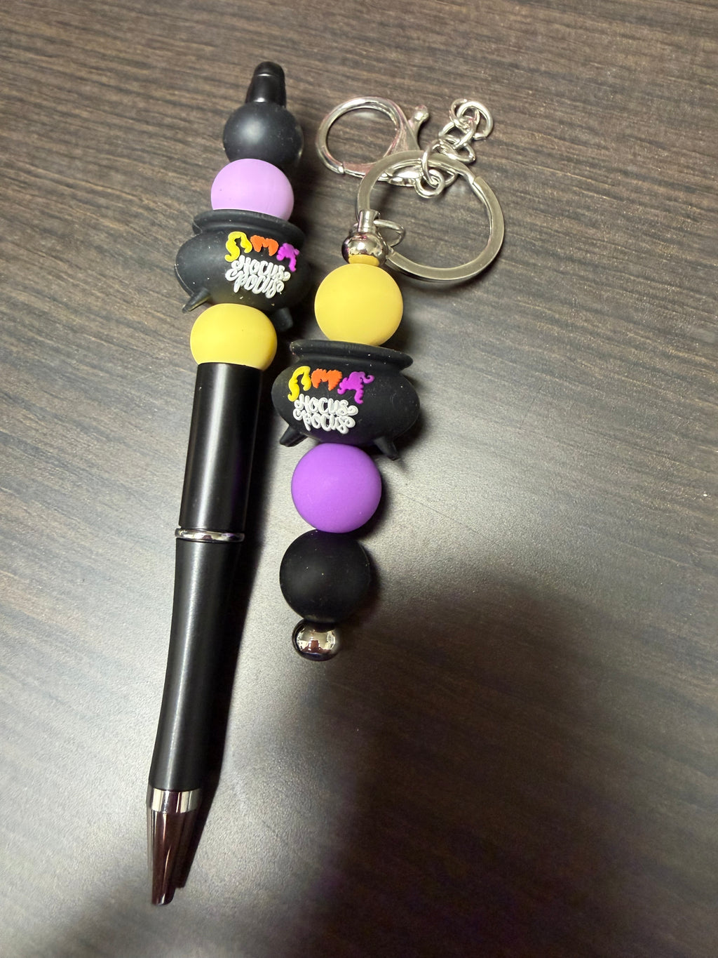 Halloween character, keychain, and pen sets.