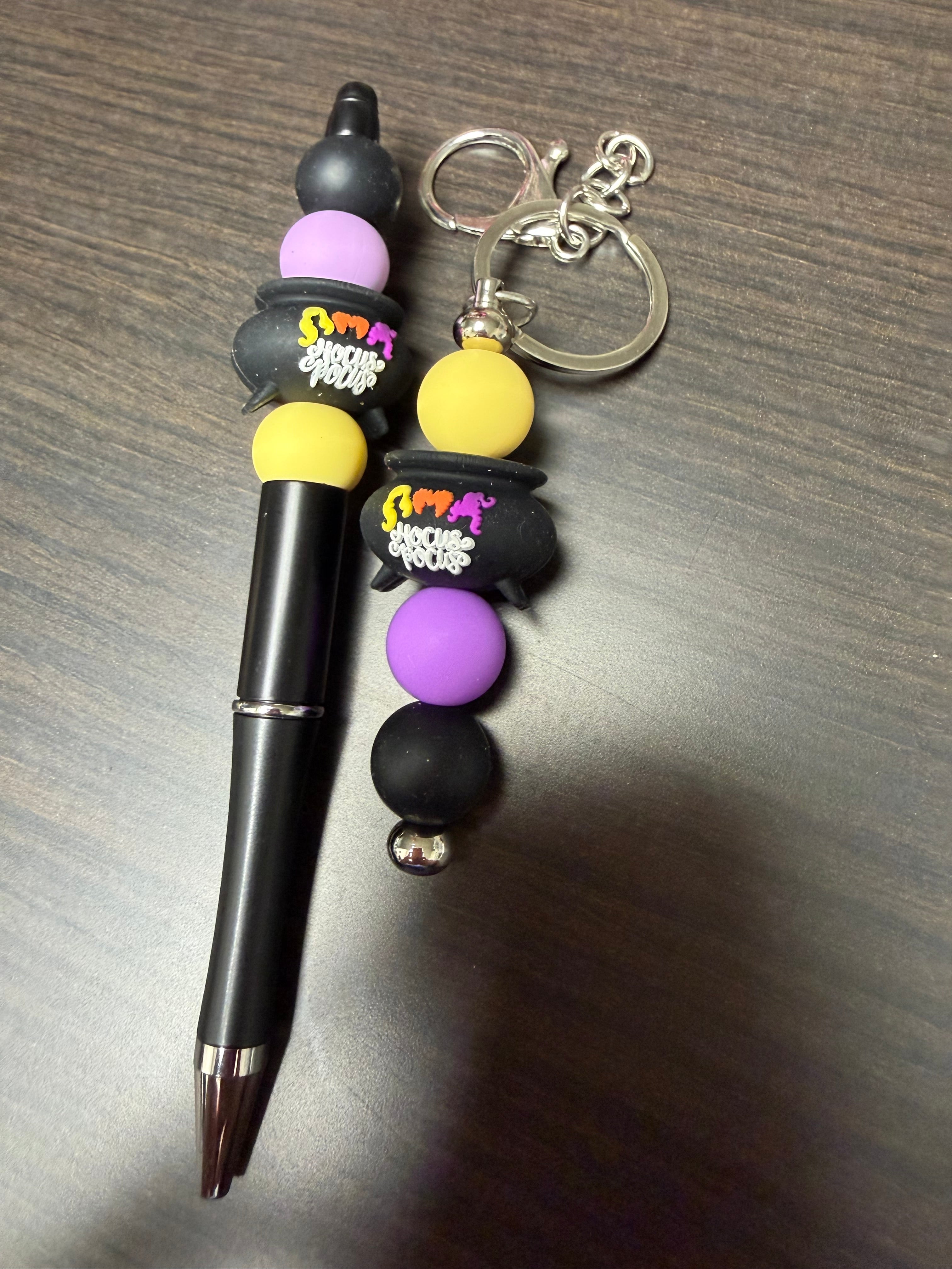 Halloween character, keychain, and pen sets.