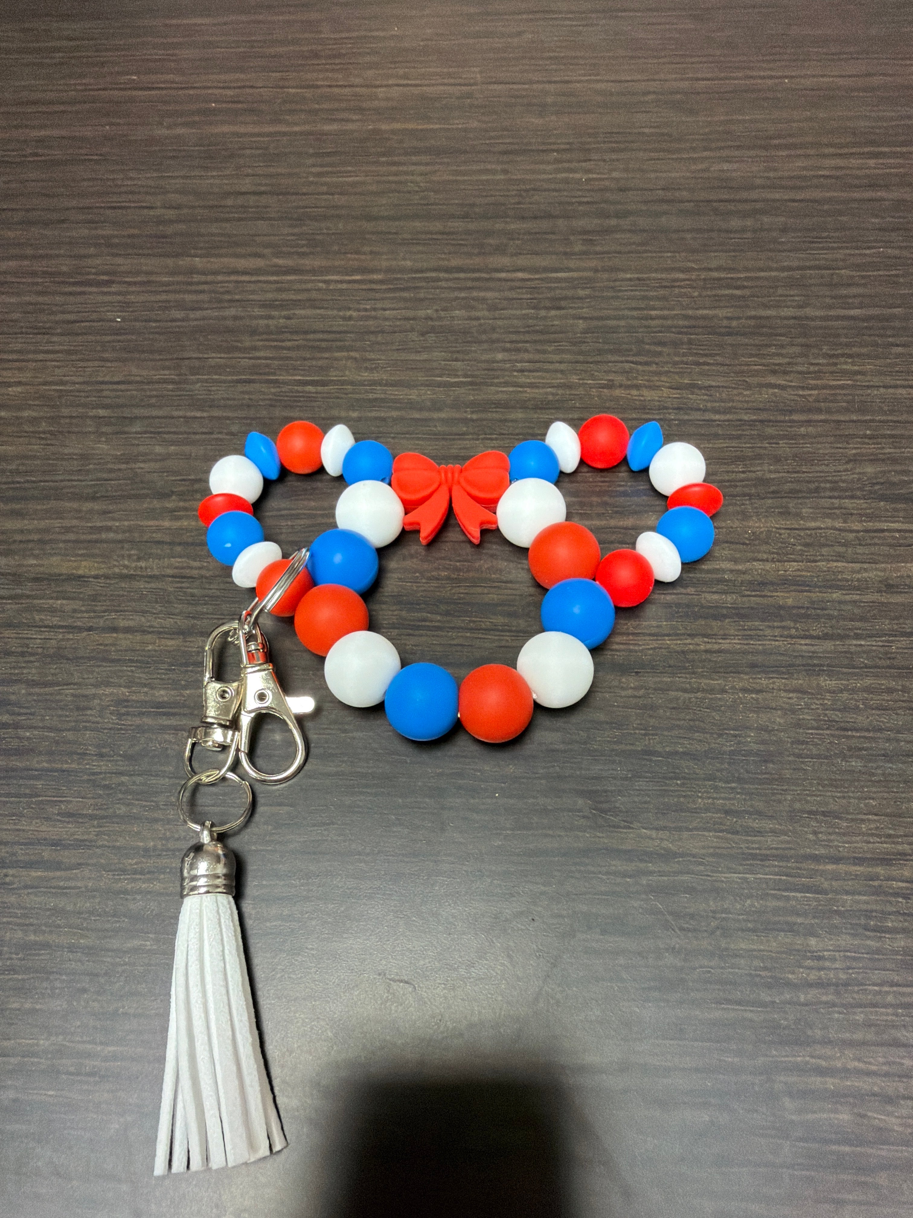 Mouse head silicone keychains.