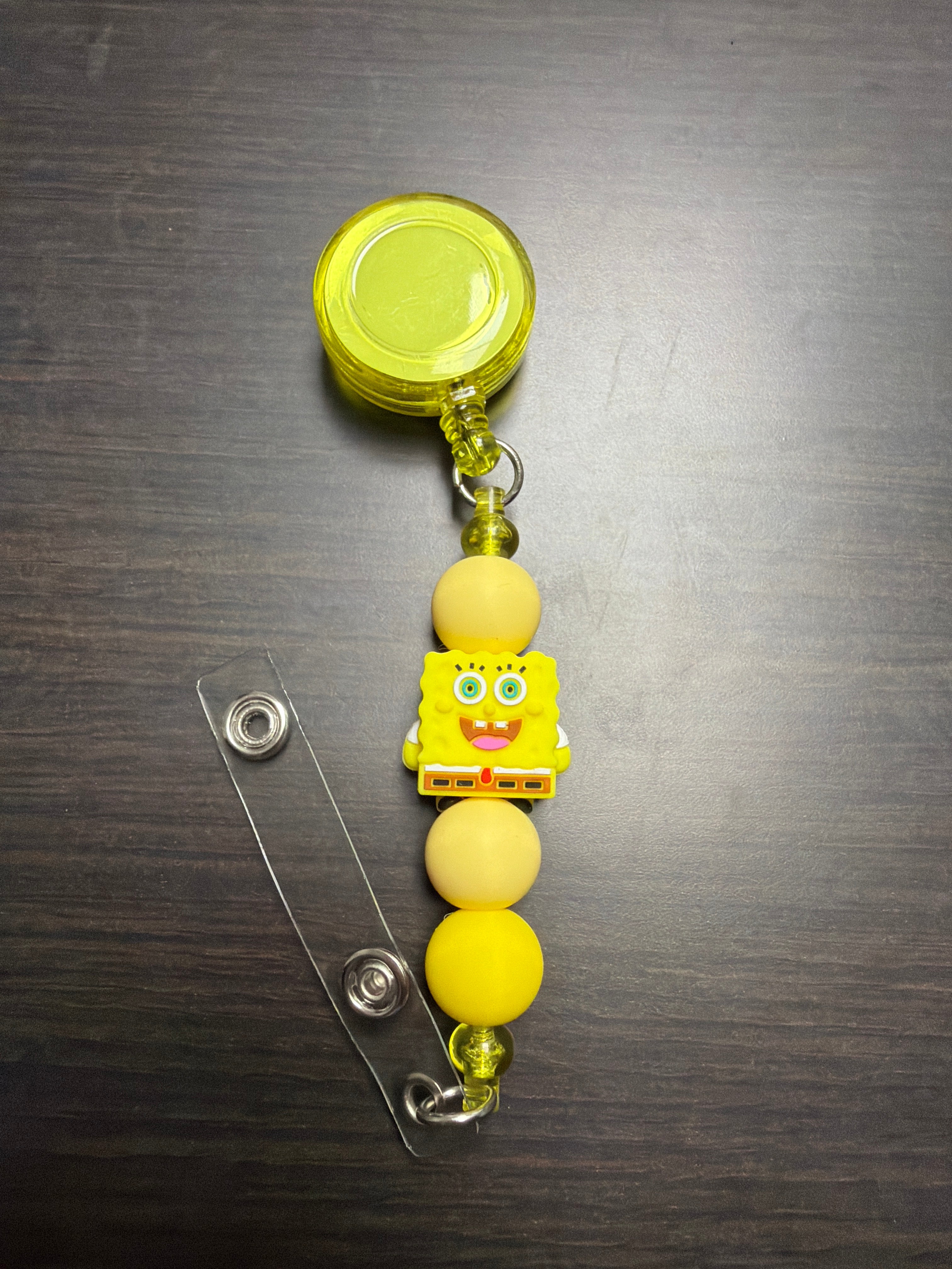 20 assorted character badge reels five dollars apiece.