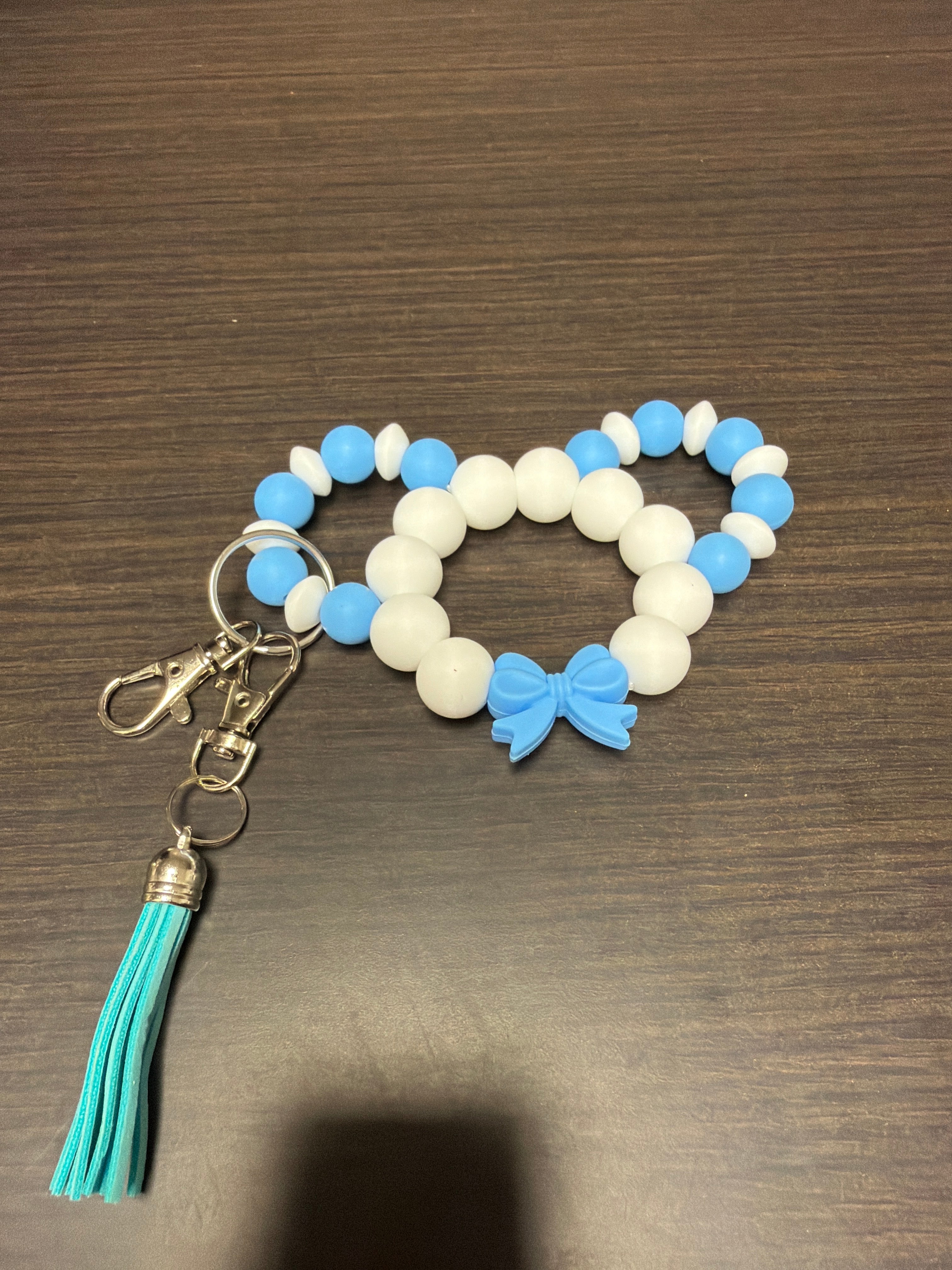 Mouse head silicone keychains.