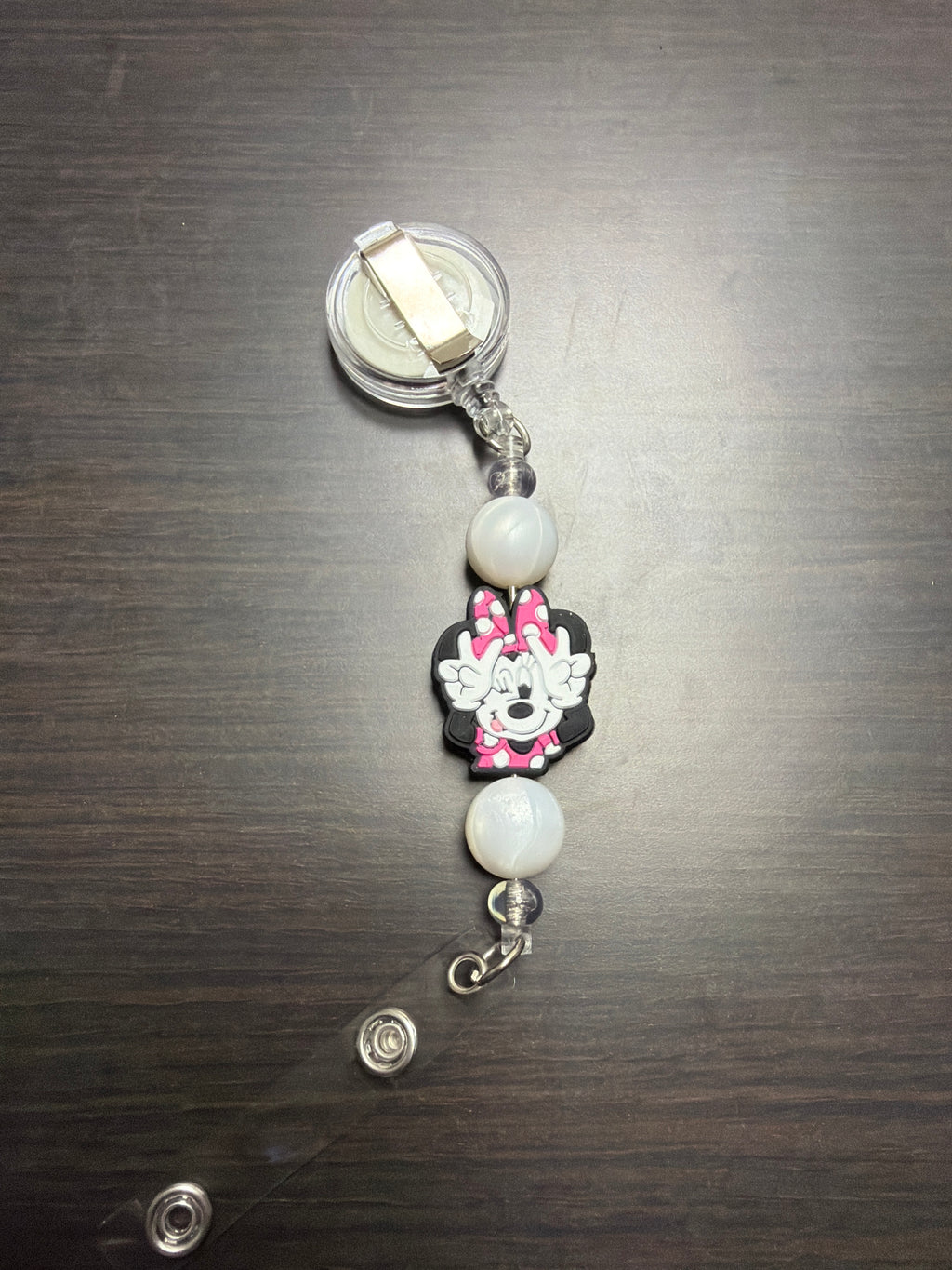 20 assorted character badge reels five dollars apiece.