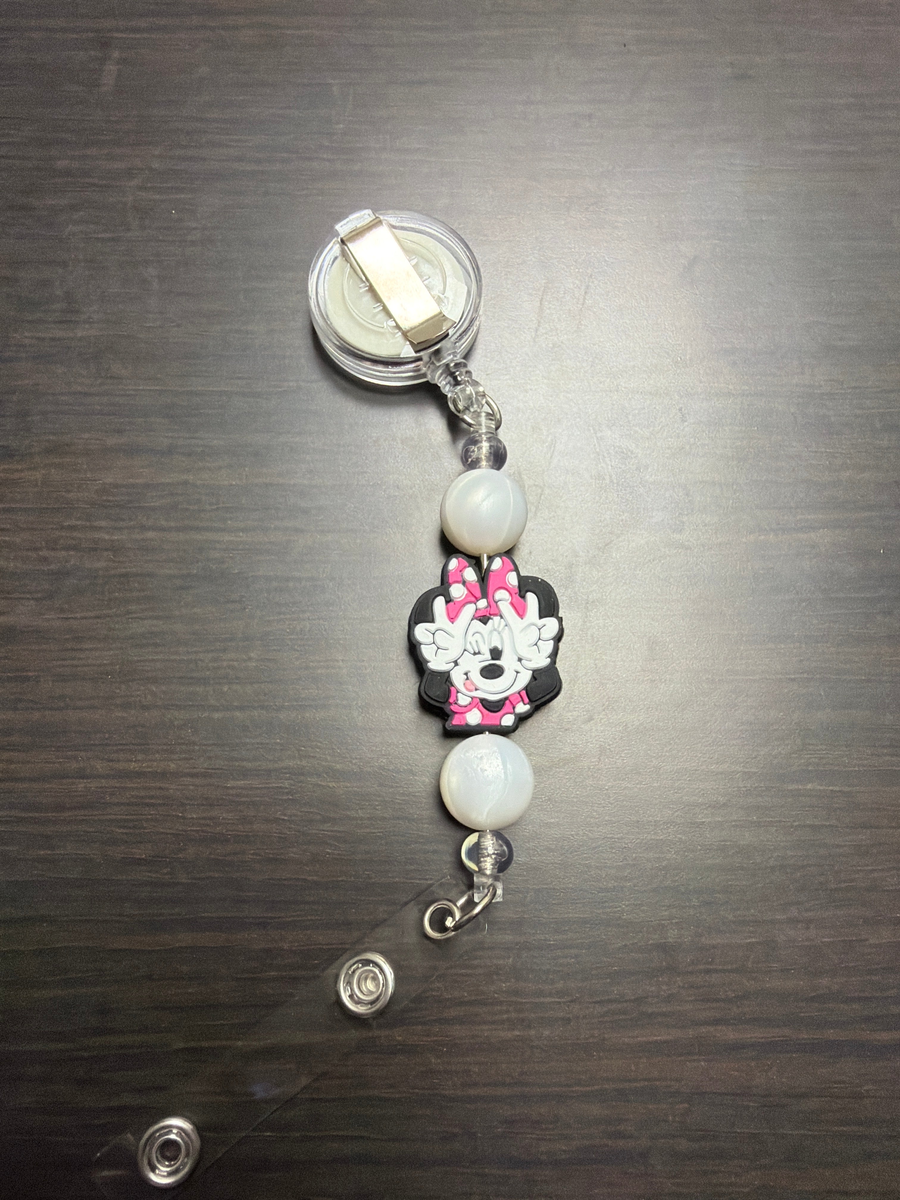 20 assorted character badge reels five dollars apiece.