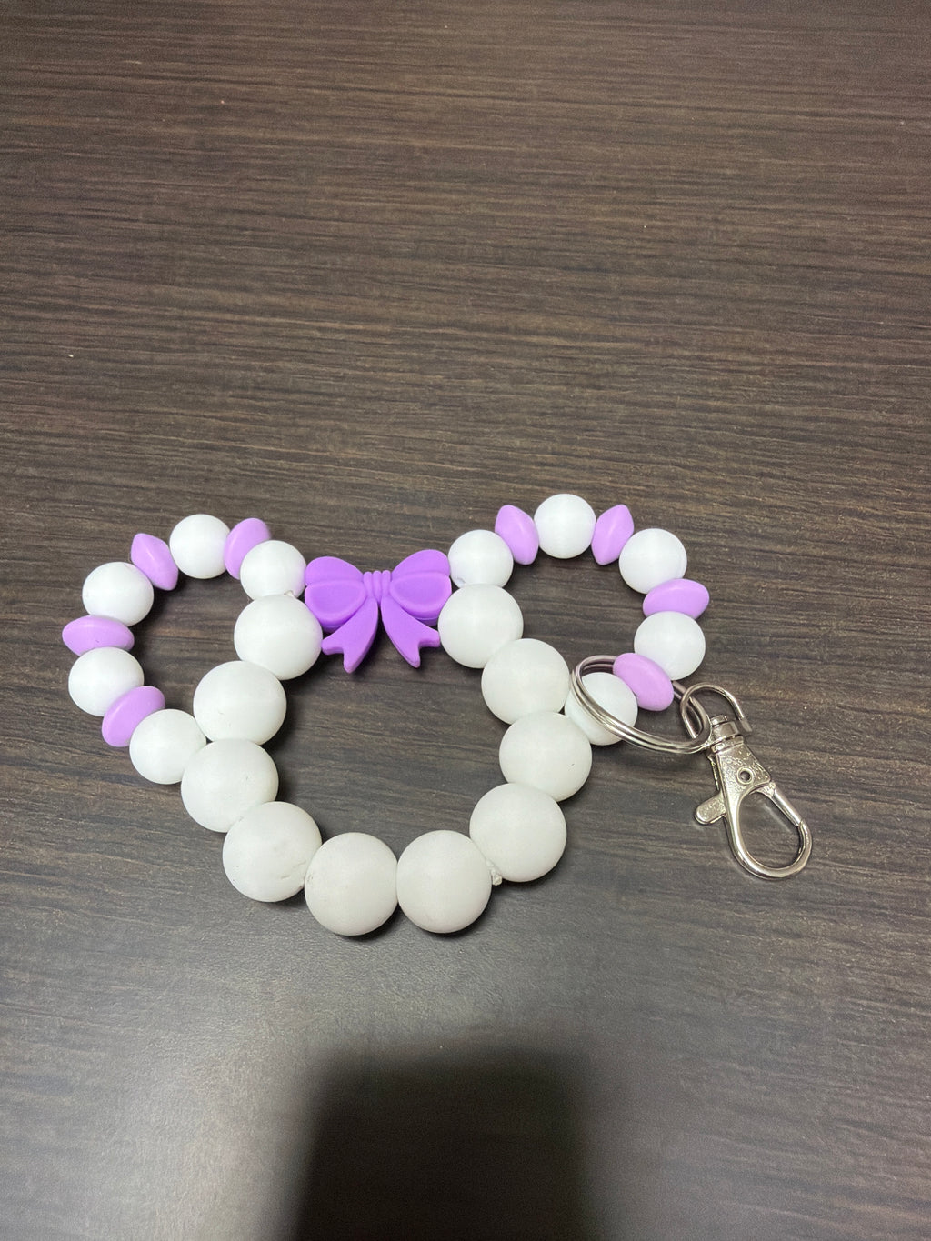 Mouse head silicone keychains.