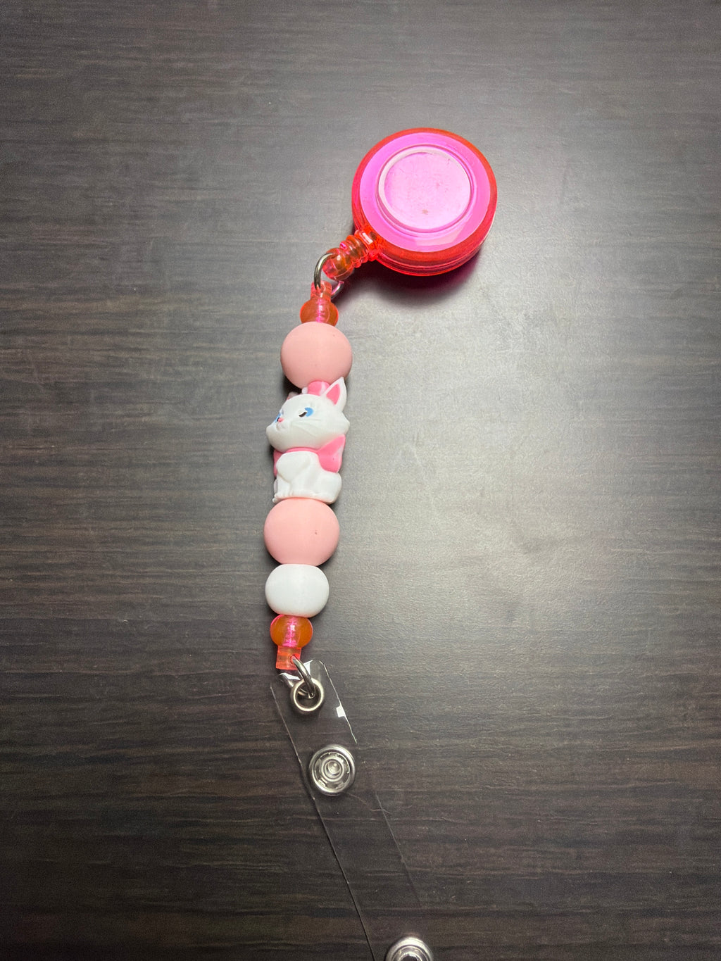 20 assorted character badge reels five dollars apiece.