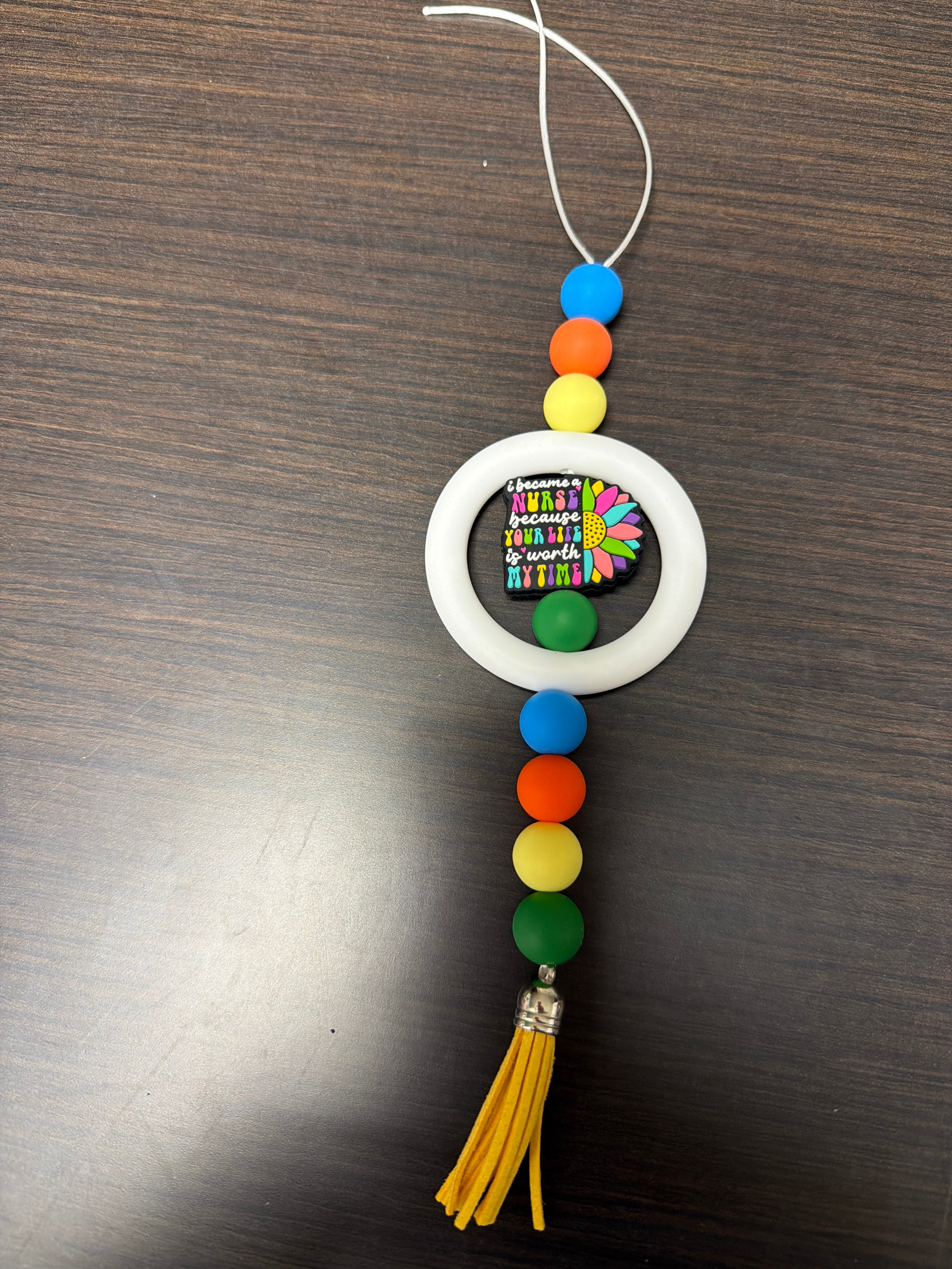 Assorted rearview mirror decorations.