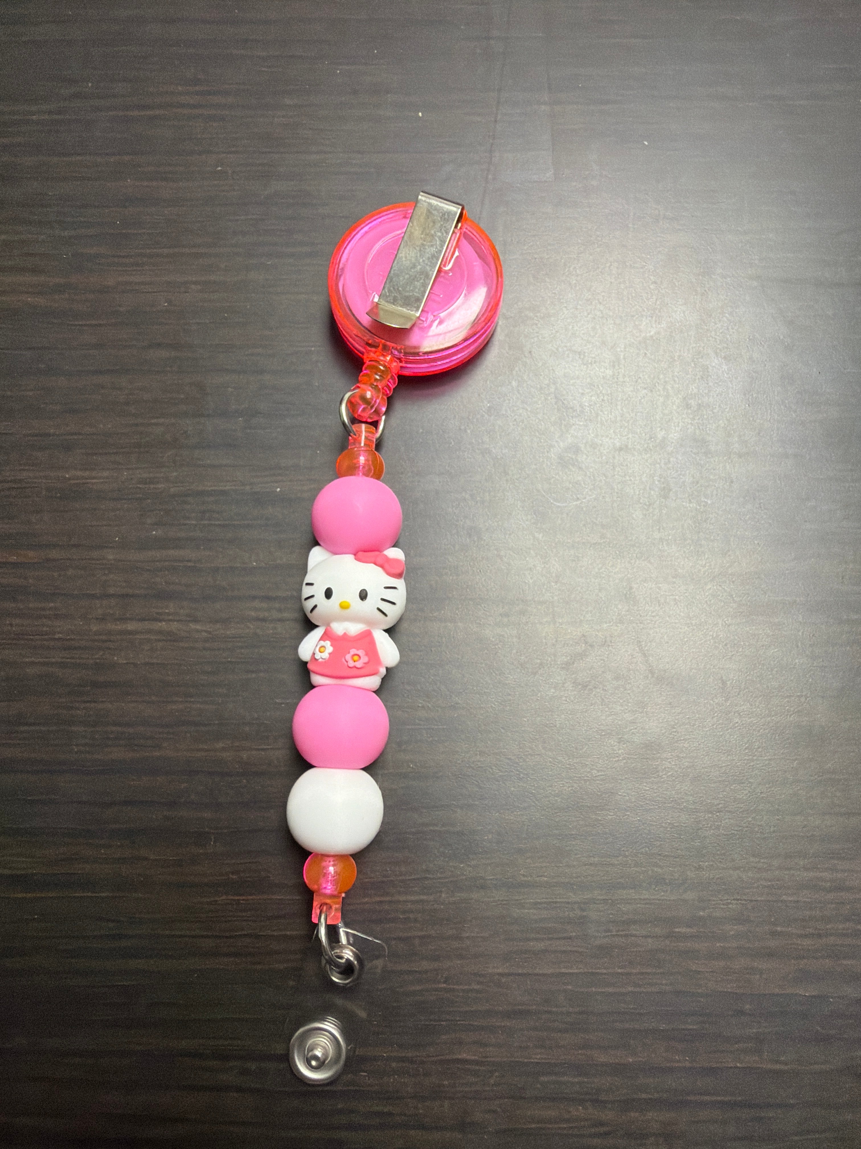 20 assorted character badge reels five dollars apiece.