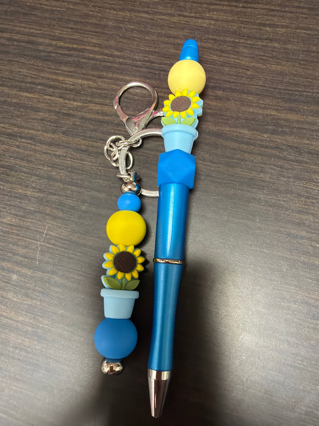 Keychain and pen combos eight dollars ￼