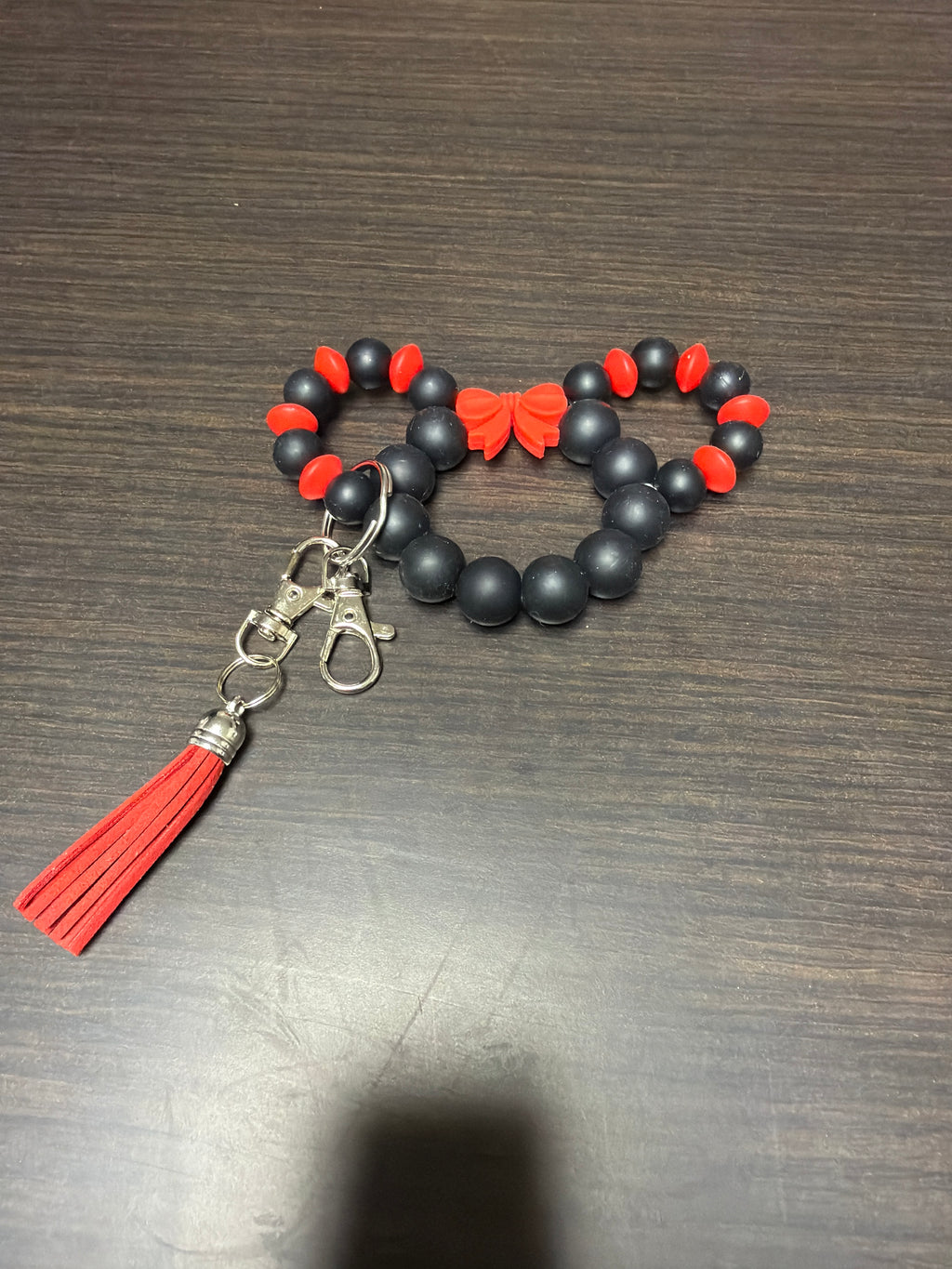 Mouse head silicone keychains.