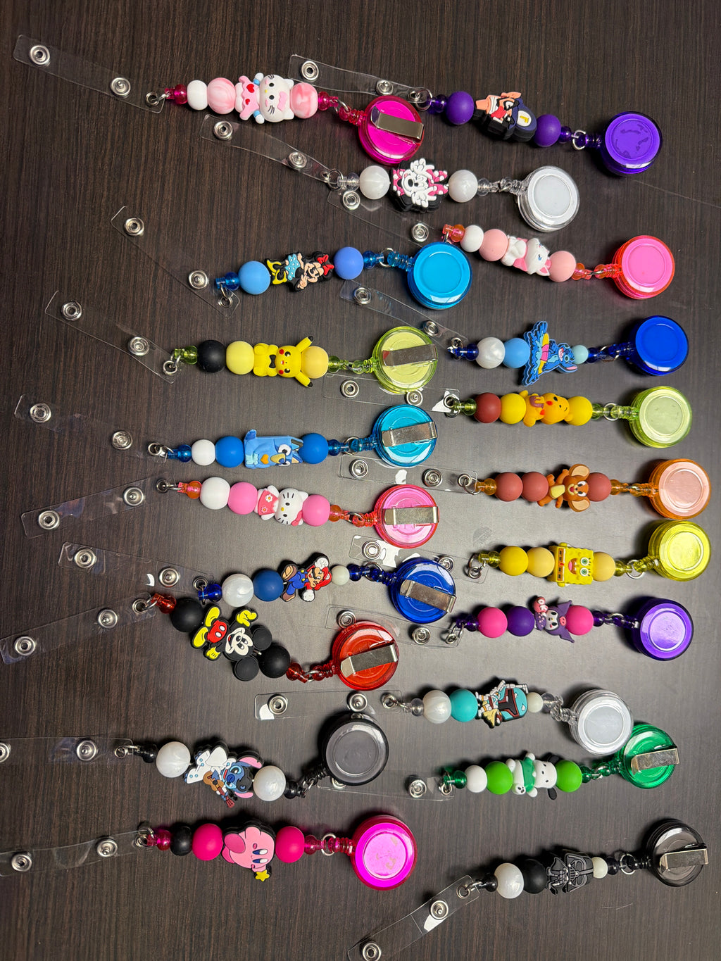 20 assorted character badge reels five dollars apiece.