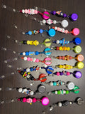 20 assorted character badge reels five dollars apiece.